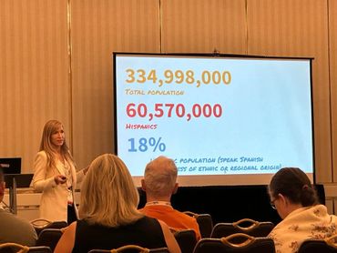 Analia Bogdan giving a presentation at the ATA conference Miami