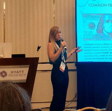 Analia Bogdan giving a presentation ATA conference Miami