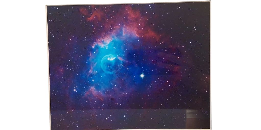 A vibrant nebula with bright stars in space.