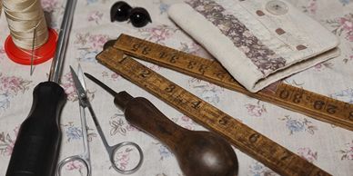 Some of the tools used to make a handmade mohair bear.