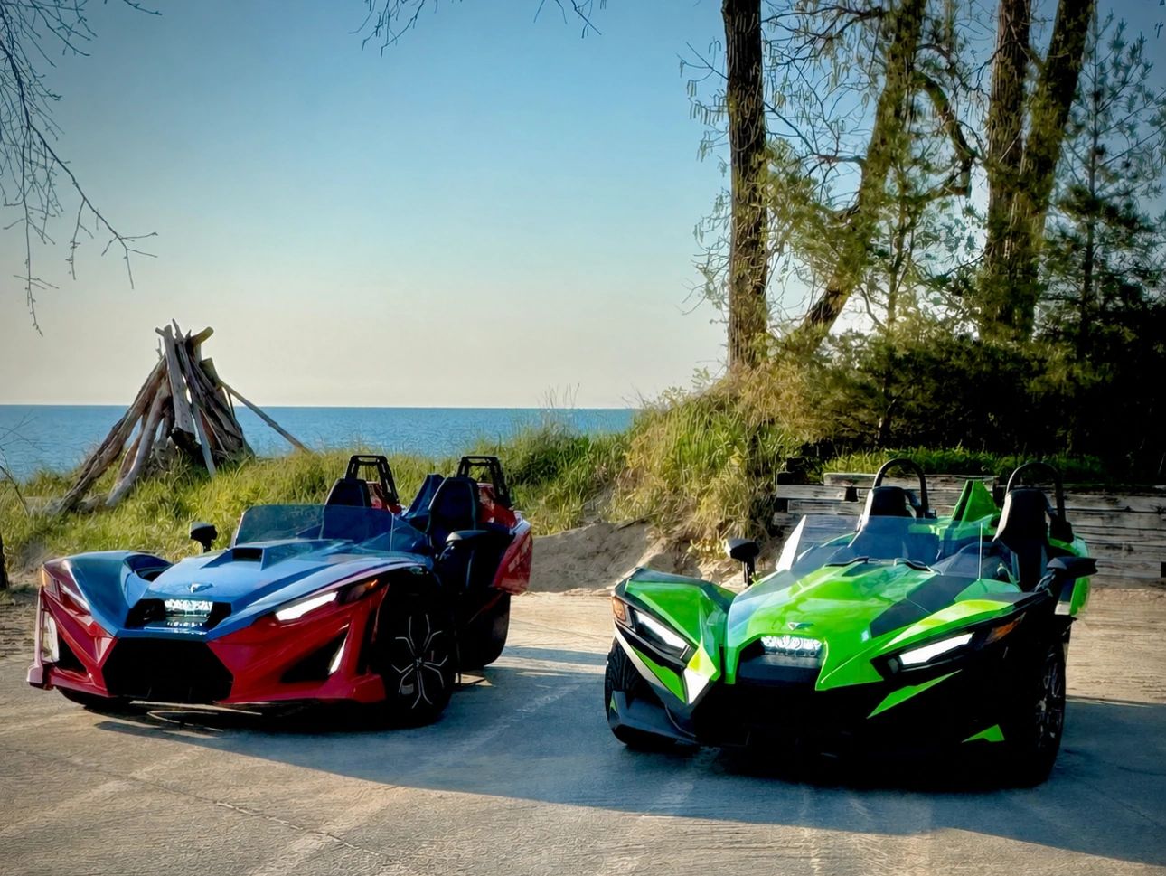 Sleek Polaris slingshots parked along lake michigan