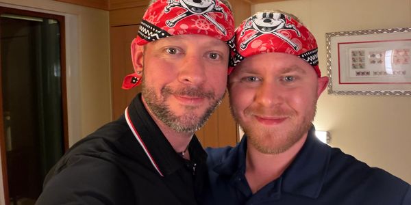 Fox and Brandon onboard the Disney Dream getting ready for Pirate Night.