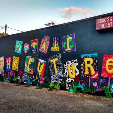 Repair the Future mural behind Pedro's & Kim Upholstery and Top Burmese.