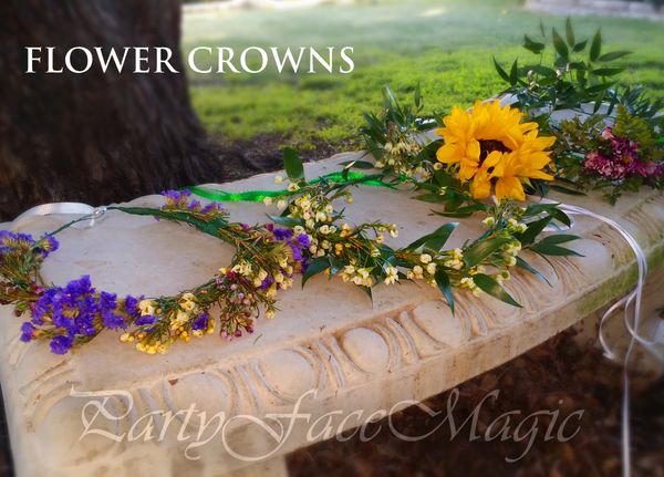 Party Face Magic Flower crowns displayed on a stone bench.