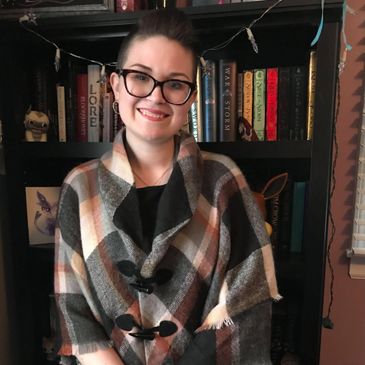 A picture of me smiling and being professional.