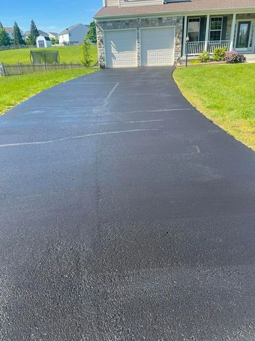 Still wet sealed driveway - shiny