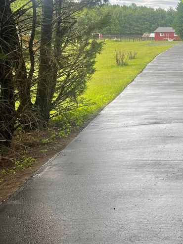 Very long fresh sealed driveway 