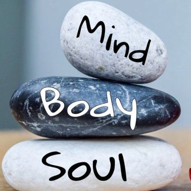 Stacked stones labeled Mind, Body, Soul.