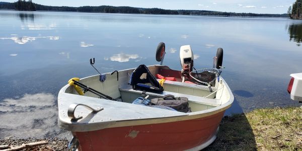 Fishing boat with motor on Wilson Lake