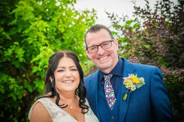 Smiling couple on their wedding day. 