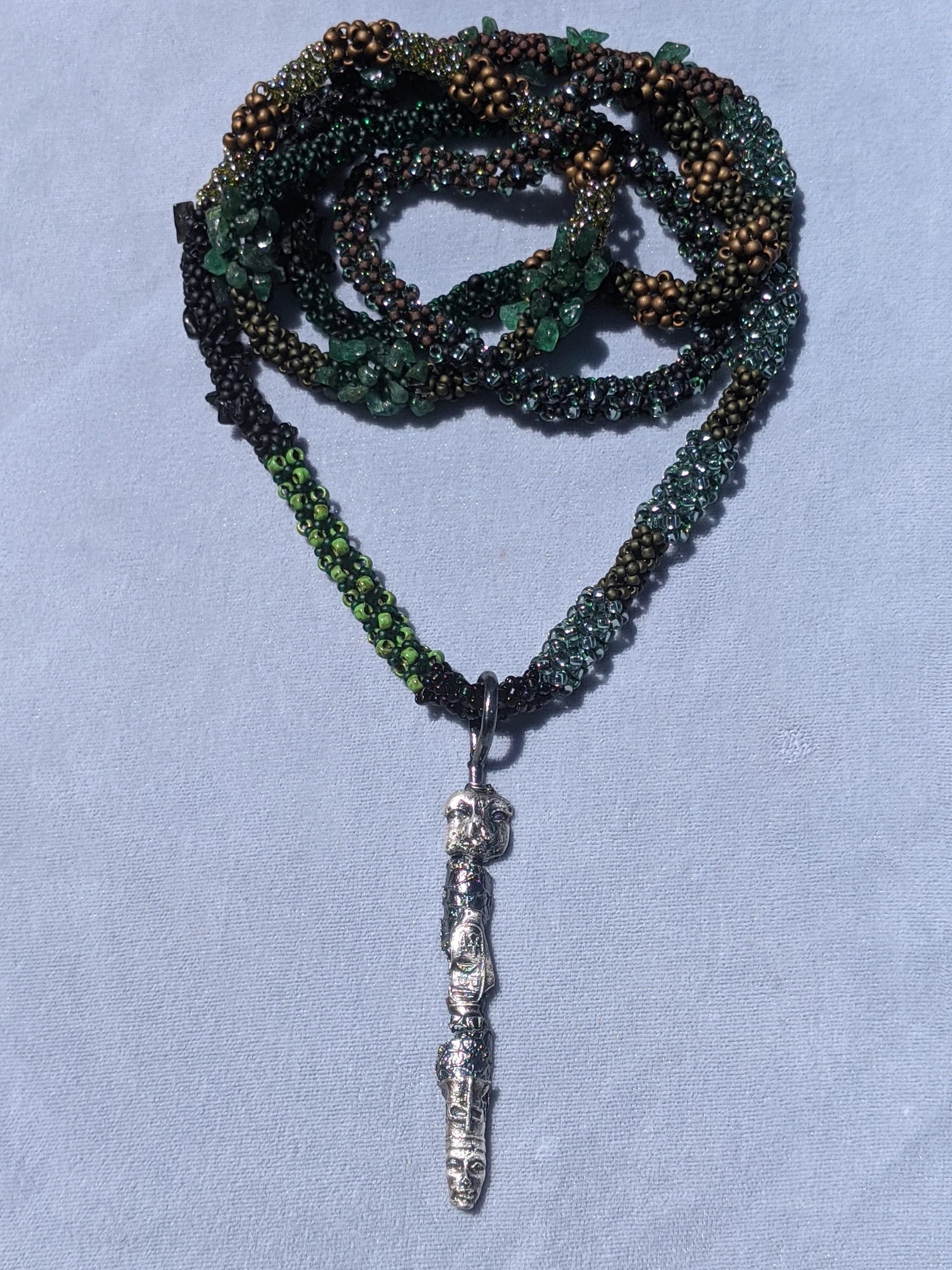 The Amulet - handcrafted pure silver pendant on a chain of gemstones and glass beads