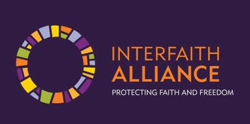 Logo of Interfaith Alliance with colorful circular design and slogan.