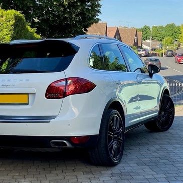 Porsche Cayenne after being Detailed, decontaminated, paint corrected, and ceramic polished