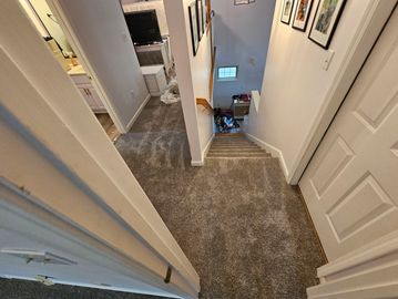 Residential Carpet including stairs.