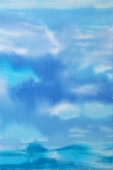 Abstract blue sky and clouds with a soft gradient effect.