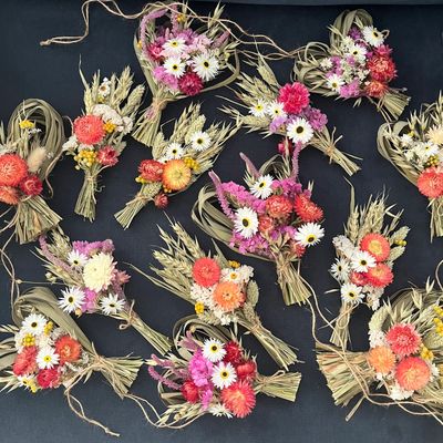 Home Grown Dried Flower Arrangements for sale at a local market event. Dried Flower Bouquets 