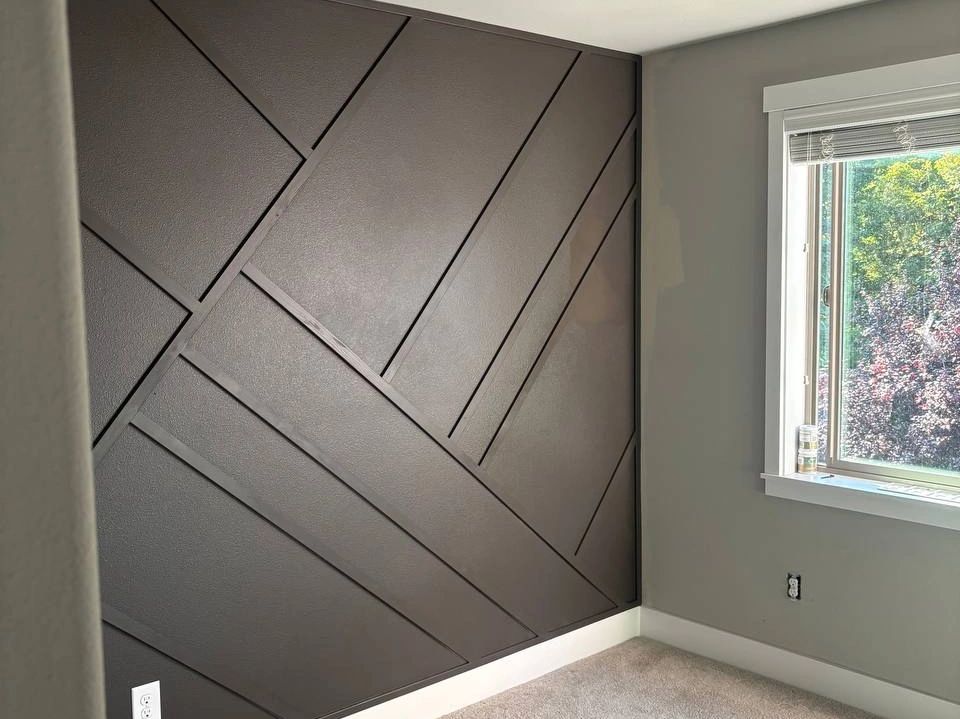Tacoma interior painting project with geometric accent wall by CHR Construction Group