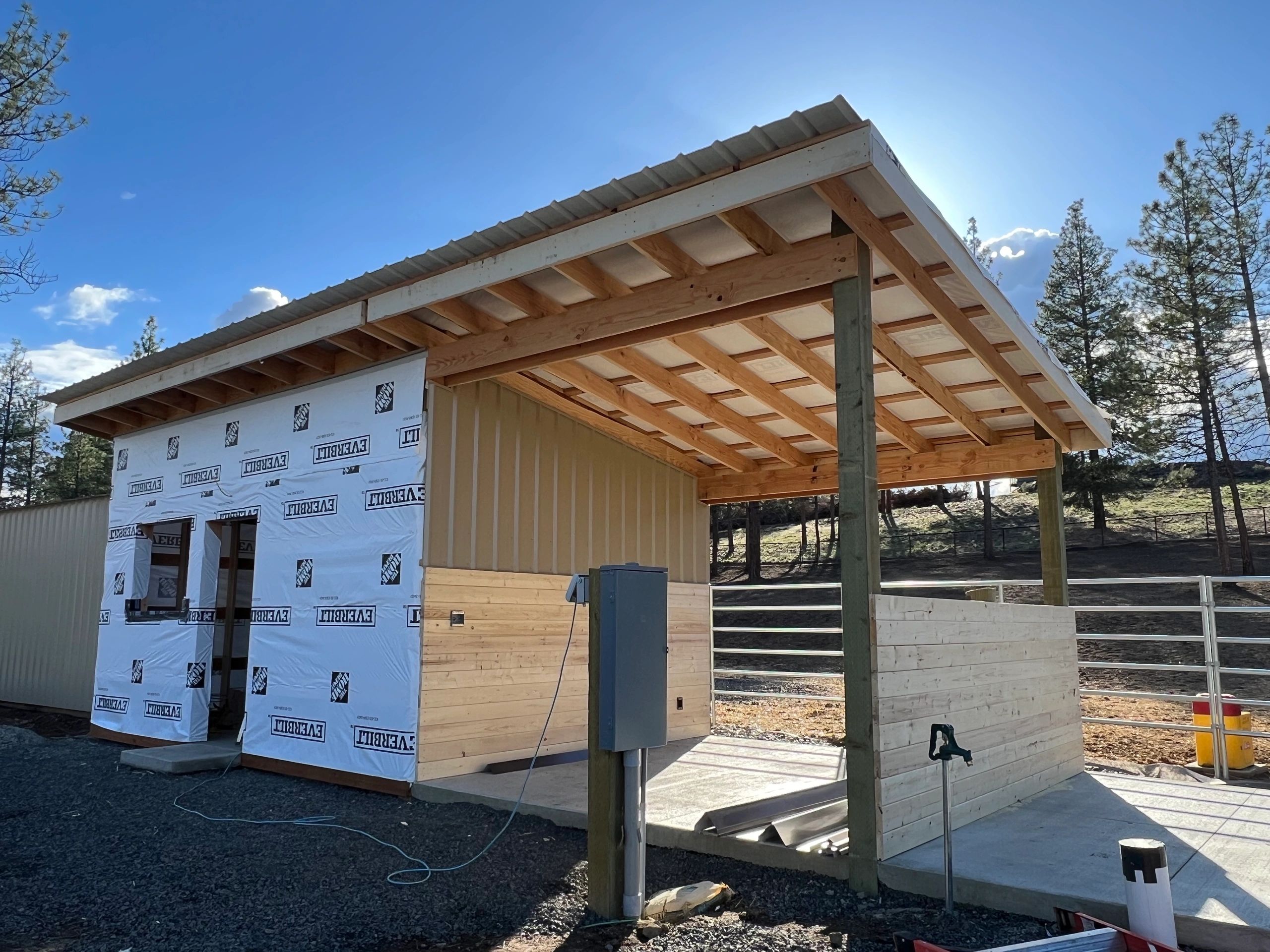 Custom pole barn and horse shelter construction project in Redmond, Oregon.