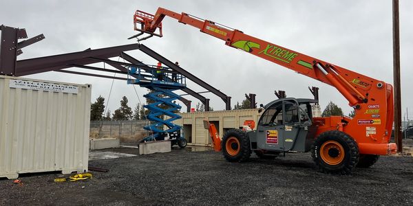 Steel building construction and equipment operation in Central Oregon.