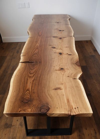 Ai generated Image of a Live edge Hard wood table made for The Wood Place