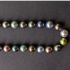 Multi-colored pearl strand