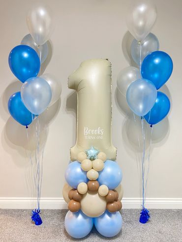 Helium balloons with a number tower