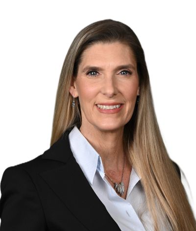 Professional woman with long blonde hair in business attire.