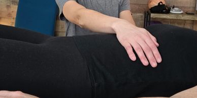 Person receiving a massage on their back.