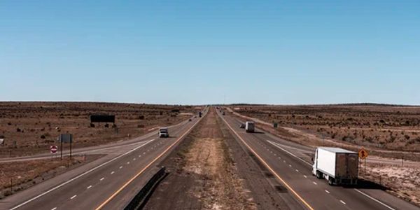 Trucks in the wide open highway