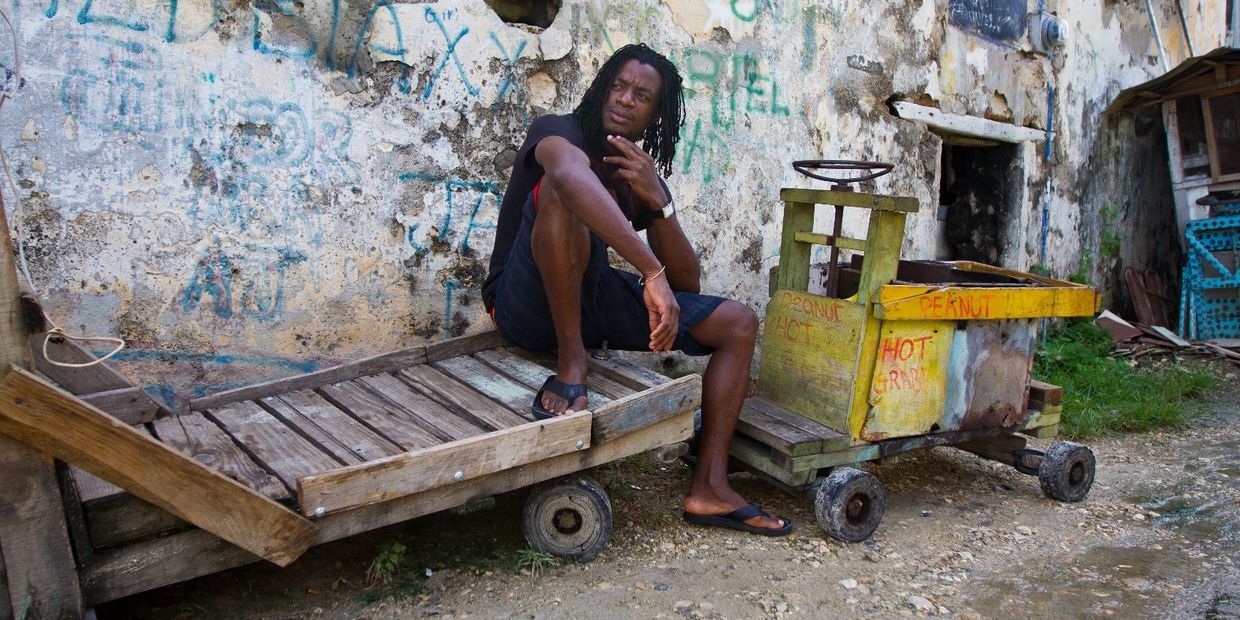 Lawgiver The Kingson reggae artist on a push cart in Jamaica