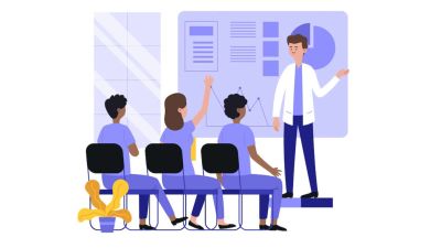 A medical professional presents data to an attentive group of healthcare workers.