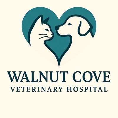 Logo of Walnut Cove Veterinary Hospital featuring a cat and dog in a heart.