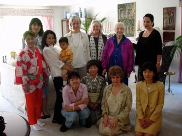 a group of people in a living room