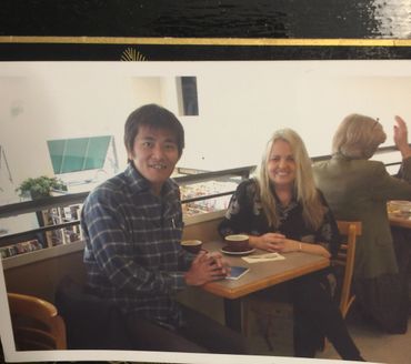 a man and a woman sitting at a table