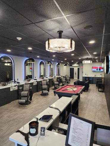 Relaxing atmosphere at Exclusively Men's Barber & Spa with expert grooming for modern men's styles.