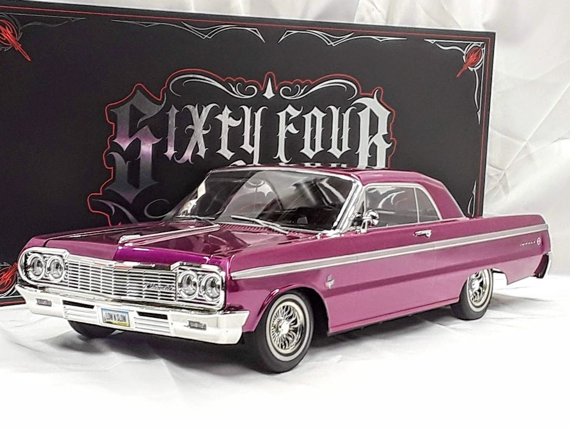 Purple classic 1964 Chevrolet car model with chrome details.