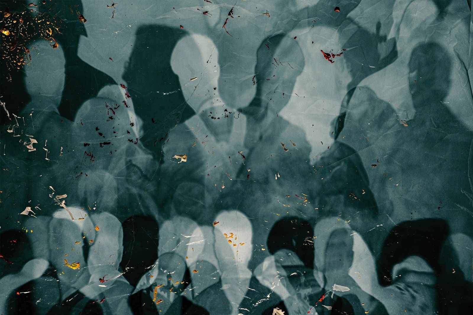 Abstract shadows of faceless people blending into a textured background.