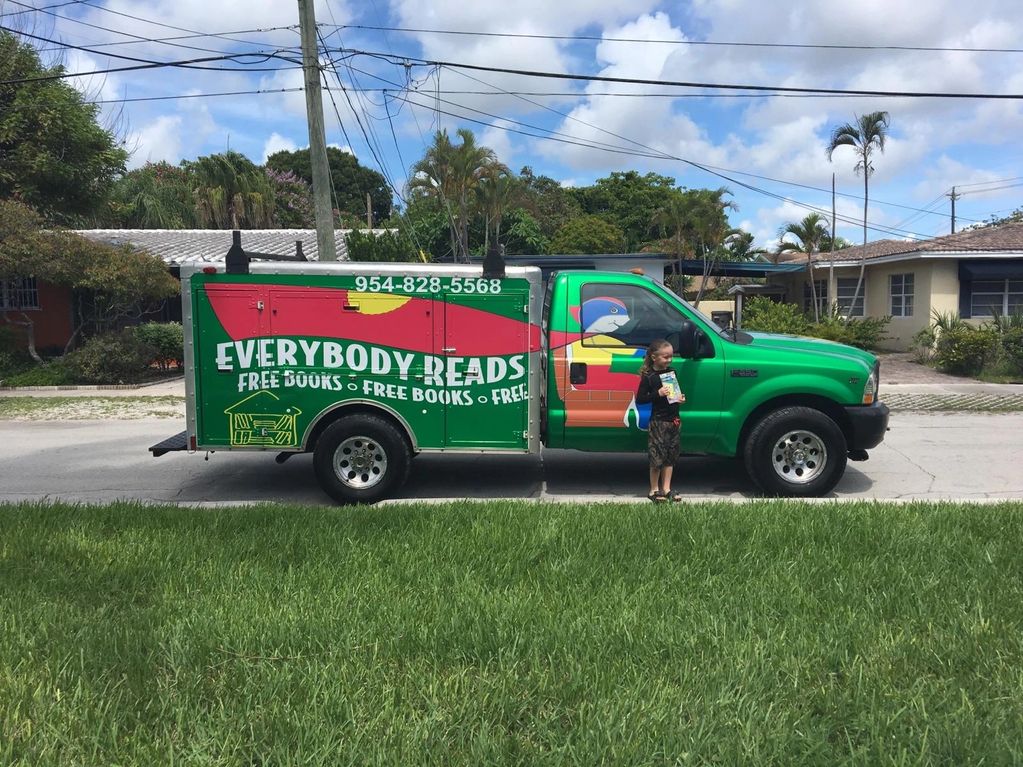 Action For Literacy Super Reader truck at a Poinciana Park neighborhood event