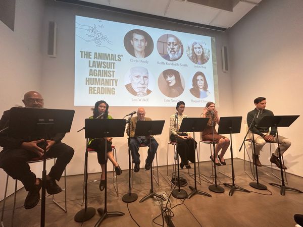 Actors participate in a staged reading titled "The Animals' Lawsuit Against Humanity."