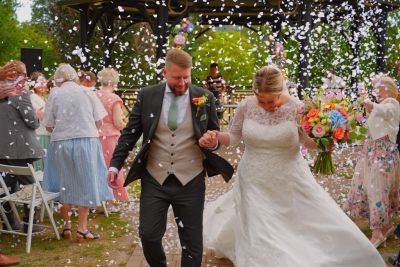 Bride and Groom confetti shot
