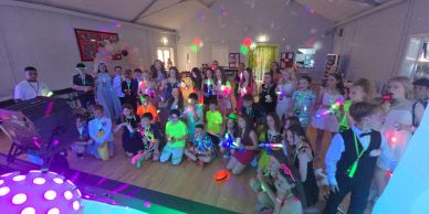 year 6 leavers party in Middlewich Cheshire all kids watching the photo slideshow 