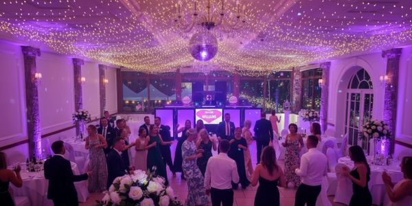 dj with love letters and post box packed dancefloor 