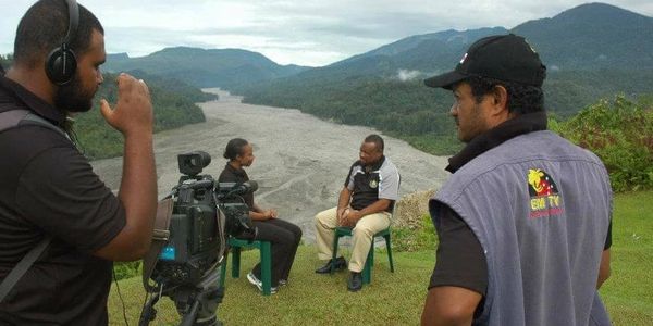 Filming the impacts of mining in PNG, on how the sediments from the mine have damaged the river and 