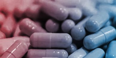Close-up of capsules in shades of blue and red.