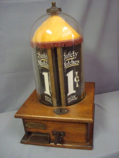 Antique match machine
Antique vending machine
Penny match machine
Antique Gumball Machine
Penny Gum 