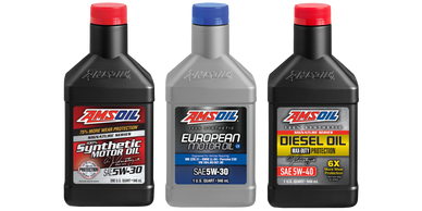 Three types of AMSOIL motor oil bottles with distinct labels and colors.
