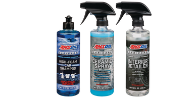 Three AMSOIL car care products: shampoo, ceramic spray, and interior detailer.