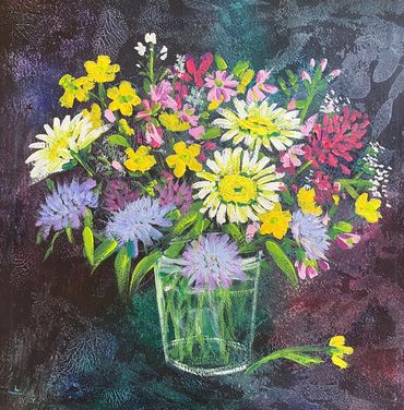 Wild flowers in jam jar including daisies, clover scabious, buttercups, cow parsley