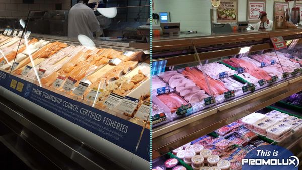 Two seafood display cases showcasing fresh fish and seafood products in a market.