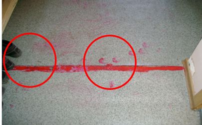 An Example of What Not to Do. No clear physical barrier results in shoes sitting ON the line and footprints show that line has been violated. An Example of What Not to Do. No clear physical barrier results in shoes sitting ON the line and footprints show that line has been violated.